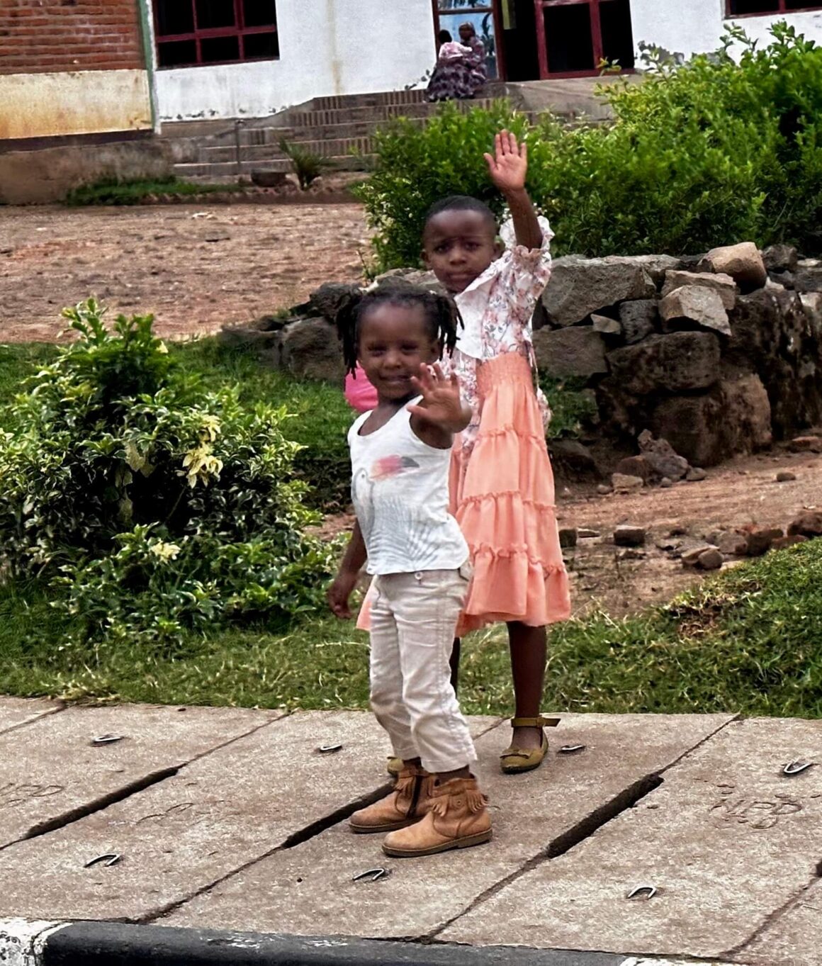 We saw these friendly young girls in Nyange waving to us