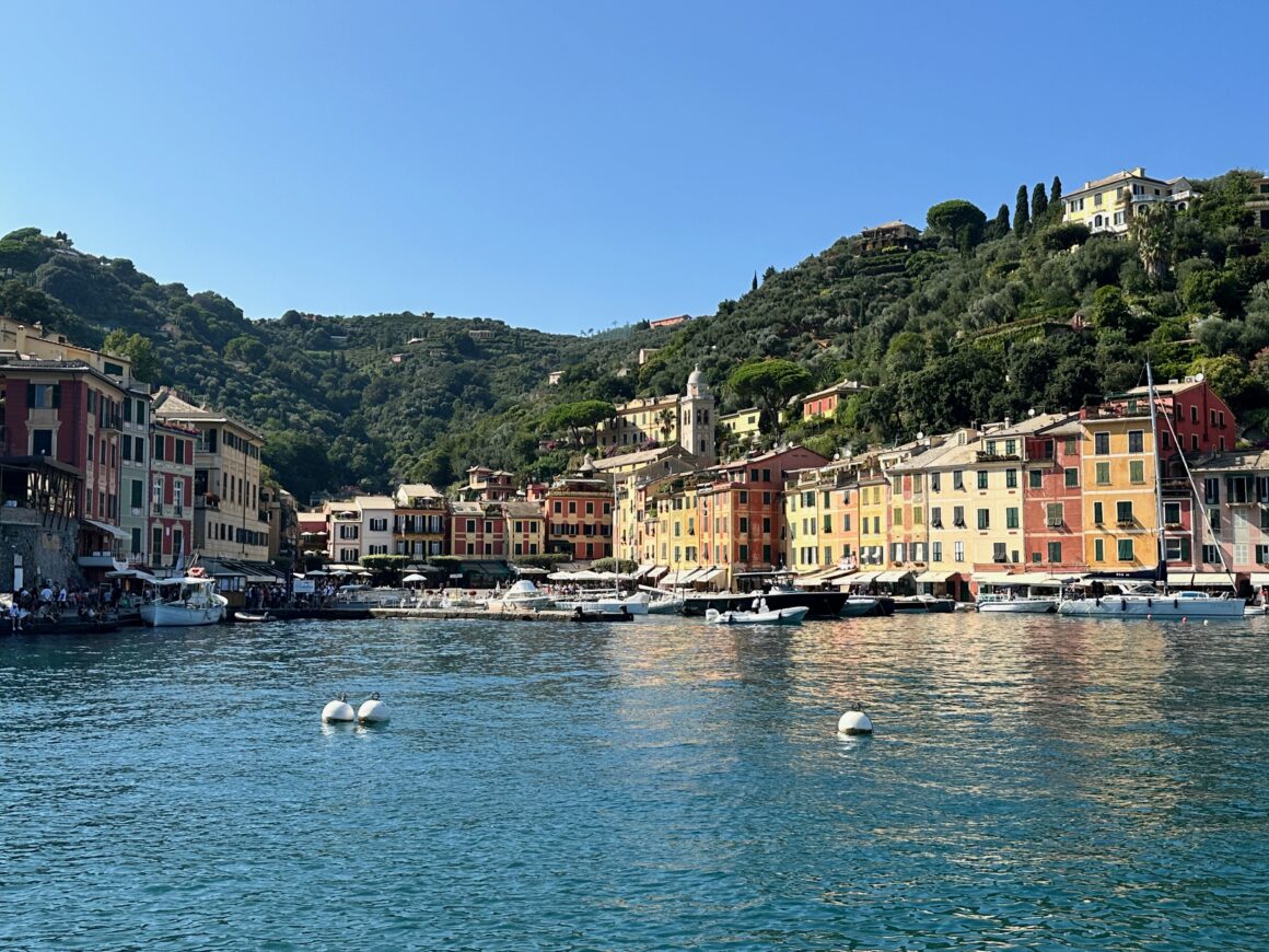 pastel colored portofino buildings hugging the waterfront in portofino italy