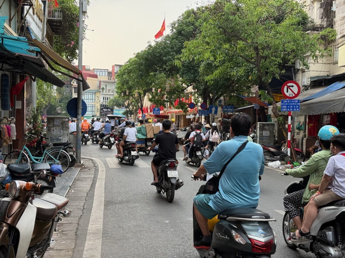 motorcyclist culture old quarter hanoi vietnam